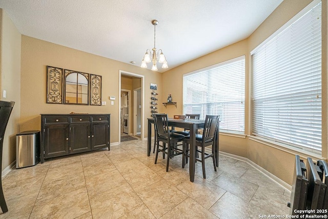 26304 Tiffnilee, San Antonio, TX 78255 - dining area with a chandelier and baseboards