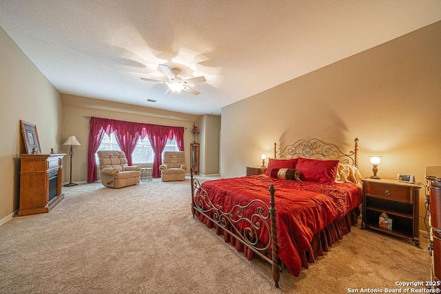 26304 Tiffnilee, San Antonio, TX 78255 - bedroom with carpet flooring, ceiling fan, and a textured ceiling