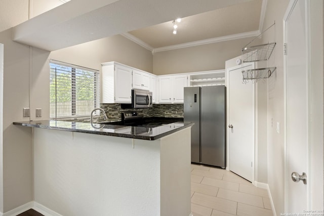 4242 Shady Tree Ln, San Antonio, TX 78247 - kitchen with stainless steel appliances, a peninsula, dark stone countertops, ornamental molding, and tasteful backsplash