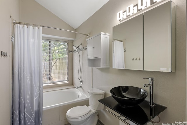 4242 Shady Tree Ln, San Antonio, TX 78247 - full bathroom featuring vaulted ceiling, shower / bath combination with curtain, and vanity