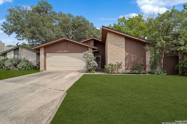 4843 De Paul, San Antonio, TX 78249 - mid-century home featuring brick siding, an attached garage, and a front yard