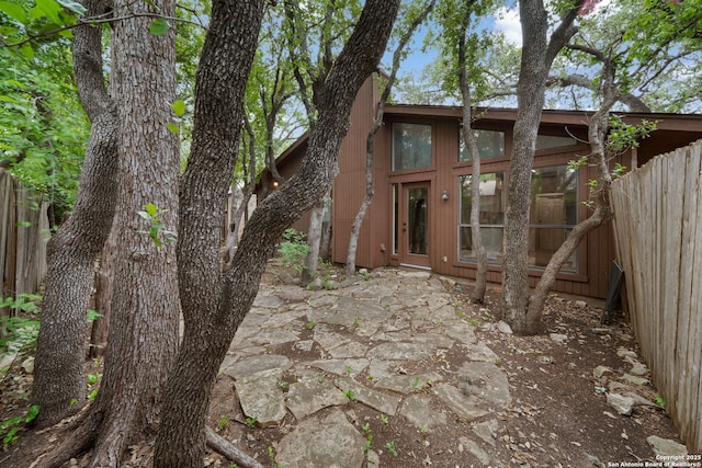 4843 De Paul, San Antonio, TX 78249 - back of property featuring a patio area and a sunroom