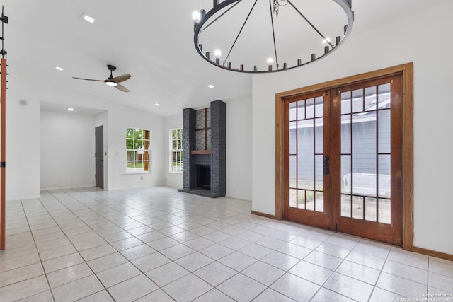 5530 Rangeland, San Antonio, TX 78247 - unfurnished living room featuring french doors, light tile patterned floors, lofted ceiling, a ceiling fan, and a brick fireplace