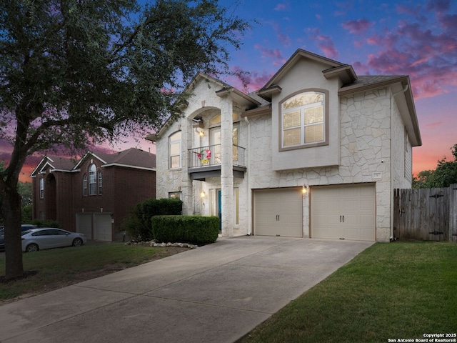 5 Greta Dr, San Antonio, TX 78248 - view of front facade with stone siding, an attached garage, a balcony, and concrete driveway