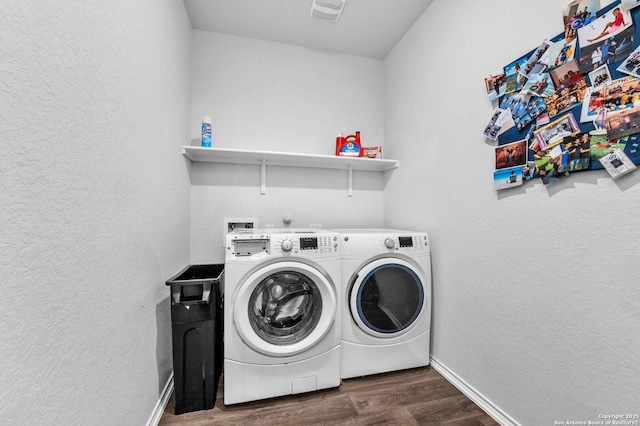 14016 Breccia Loop, San Antonio, TX 78253 - laundry room with washing machine and clothes dryer, dark wood-type flooring, and a textured wall