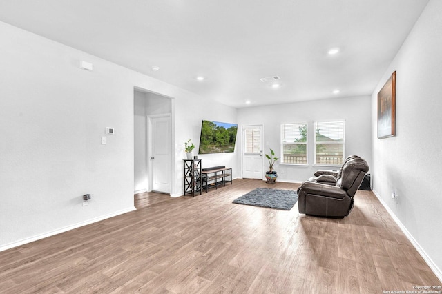 14016 Breccia Loop, San Antonio, TX 78253 - living room featuring wood finished floors and recessed lighting