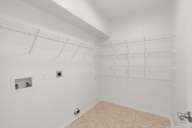 665 La Bahia Loop, New Braunfels, TX 78132 - laundry area with hookup for an electric dryer and hookup for a washing machine