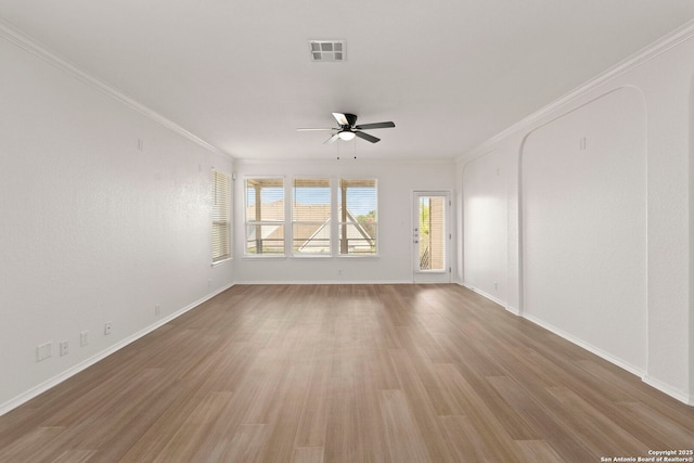 665 La Bahia Loop, New Braunfels, TX 78132 - empty room with a ceiling fan, wood finished floors, and ornamental molding