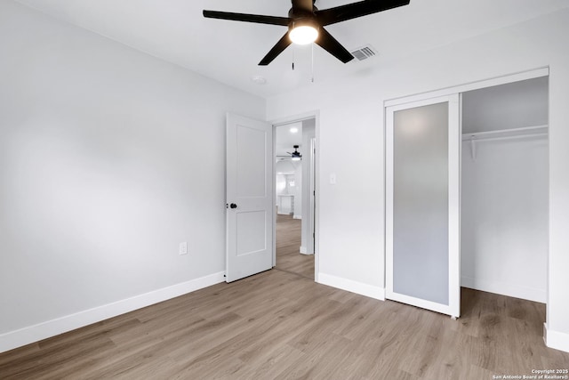 5807 Sun Rdg, San Antonio, TX 78247 - unfurnished bedroom featuring light wood finished floors, a closet, and ceiling fan