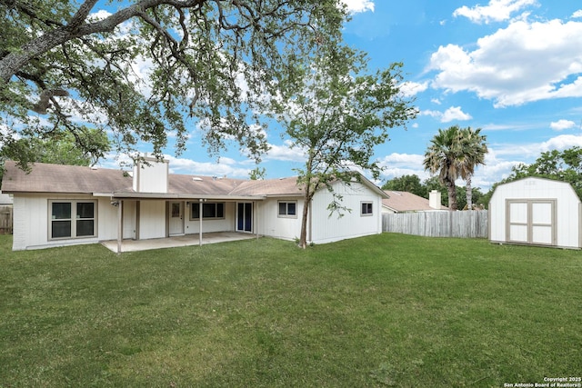 5807 Sun Rdg, San Antonio, TX 78247 - rear view of property featuring a patio area, a storage unit, a fenced backyard, and a chimney