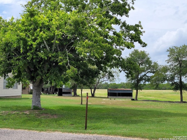 403 E Meyer, Falls City, TX 78113 - view of property's community with a yard