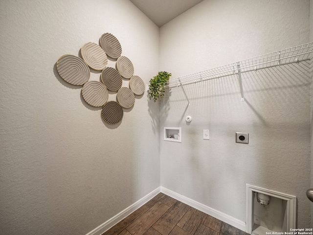 754 Farmers Dell, New Braunfels, TX 78130 - laundry room with hookup for an electric dryer, dark wood-style flooring, hookup for a gas dryer, and washer hookup
