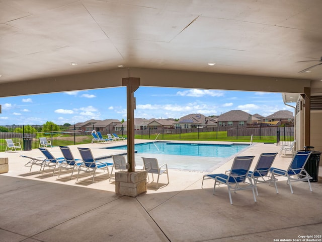 754 Farmers Dell, New Braunfels, TX 78130 - community pool with a patio, a fenced backyard, a ceiling fan, and a residential view