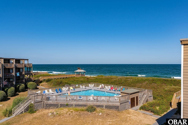 117 Sea Colony Dr Unit 211B, Duck, NC 27949 - community pool featuring a deck with water view and stairway