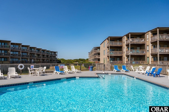 117 Sea Colony Dr Unit 211B, Duck, NC 27949 - pool featuring fence and a patio area