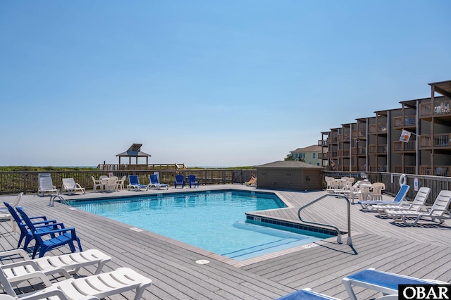 117 Sea Colony Dr Unit 211B, Duck, NC 27949 - community pool with fence and a wooden deck