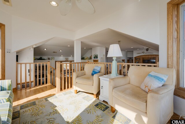 living room featuring recessed lighting, visible vents, wood finished floors, and a ceiling fan