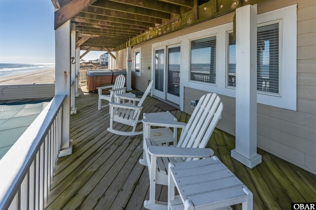 deck with a hot tub