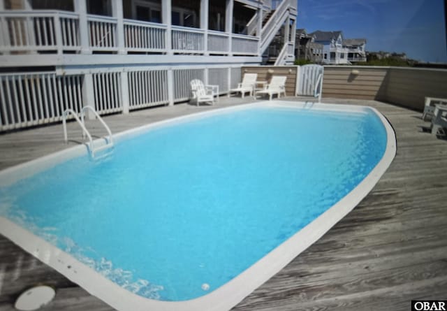 view of pool with a fenced in pool and a patio