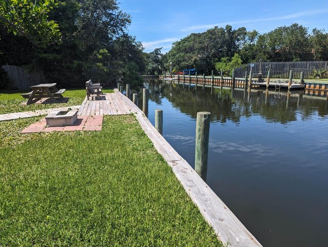 52 Fish Camp Lane Lot# 94& P95, Ocracoke, NC 27960 - dock featuring a water view and an outdoor fire pit