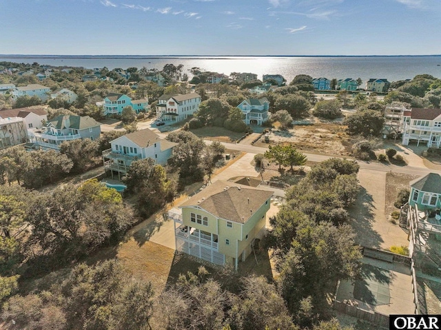 aerial view featuring a water view and a residential view