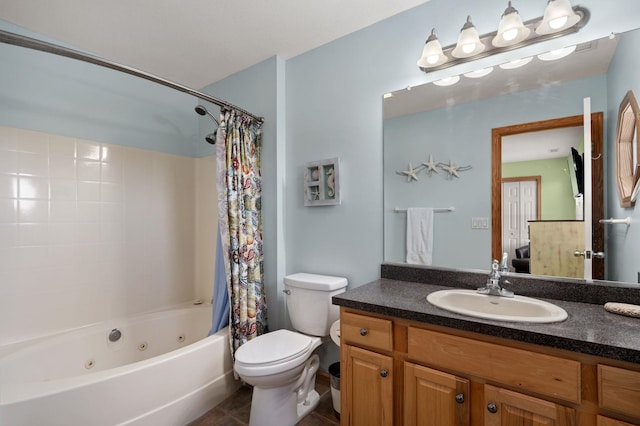 bathroom with toilet, tile patterned floors, shower / tub combo with curtain, and vanity