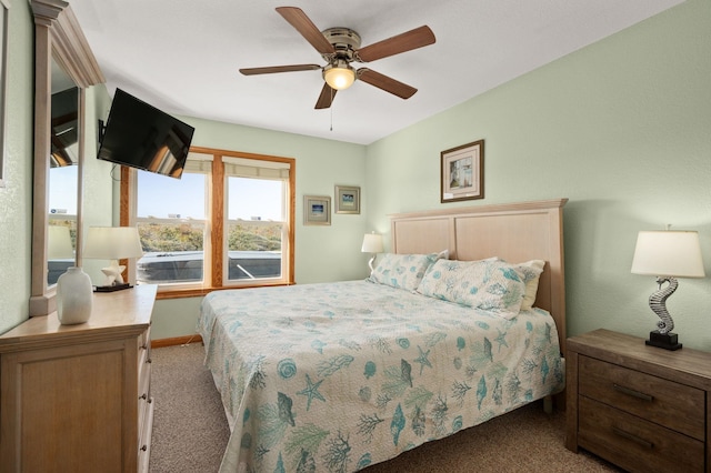 bedroom with light carpet, ceiling fan, and baseboards