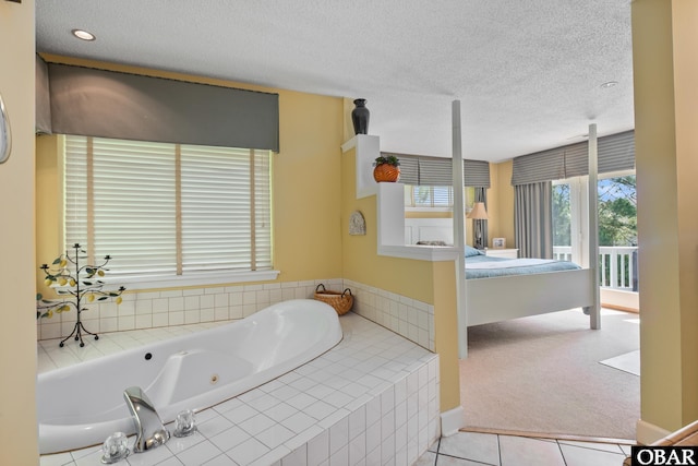 1129 Morris Dr Lot 735, Corolla, NC 27927 - full bathroom with a tub with jets, a textured ceiling, and tile patterned flooring