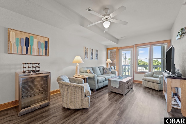 107 W Gray Eagle St Unit 103A, Nags Head, NC 27959 - living area featuring dark wood finished floors and ceiling fan