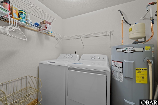 107 W Gray Eagle St Unit 103A, Nags Head, NC 27959 - washroom with water heater and independent washer and dryer