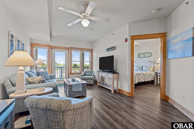 107 W Gray Eagle St Unit 103A, Nags Head, NC 27959 - living area with dark wood-style flooring and a ceiling fan