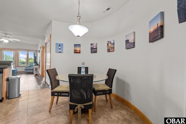 107 W Gray Eagle St Unit 103A, Nags Head, NC 27959 - dining room featuring ceiling fan and baseboards