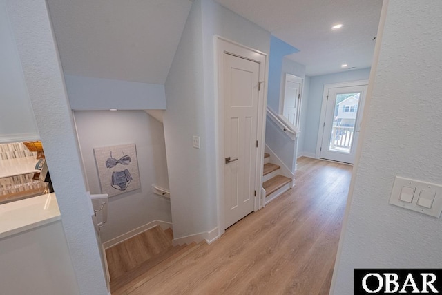 224 W Lost Colony Dr Lot 13, Nags Head, NC 27959 - hall featuring light wood finished floors, stairway, and recessed lighting