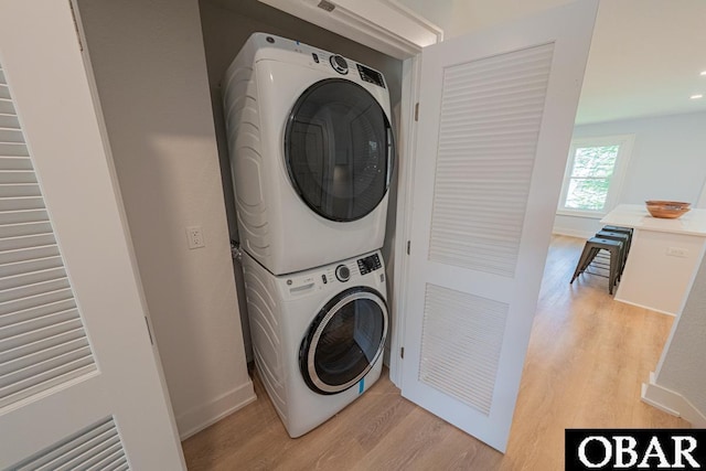 224 W Lost Colony Dr Lot 13, Nags Head, NC 27959 - laundry area with stacked washer / dryer and light wood finished floors