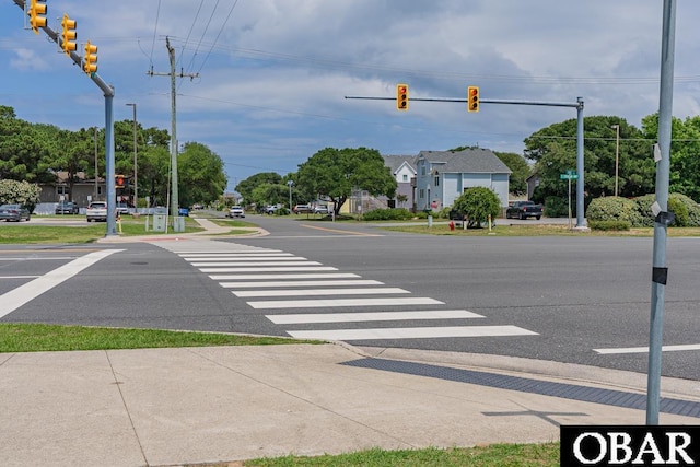 224 W Lost Colony Dr Lot 13, Nags Head, NC 27959 - view of asphalt street with traffic lights, traffic signs, and sidewalks