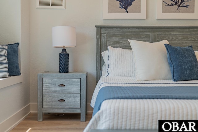 224 W Lost Colony Dr Lot 13, Nags Head, NC 27959 - bedroom featuring wood finished floors and baseboards