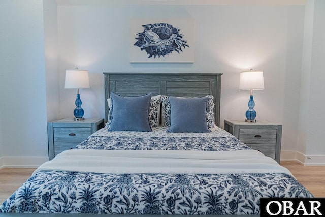 224 W Lost Colony Dr Lot 13, Nags Head, NC 27959 - bedroom with wood finished floors and baseboards