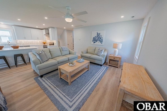 224 W Lost Colony Dr Lot 13, Nags Head, NC 27959 - living area featuring light wood-type flooring, a ceiling fan, and recessed lighting