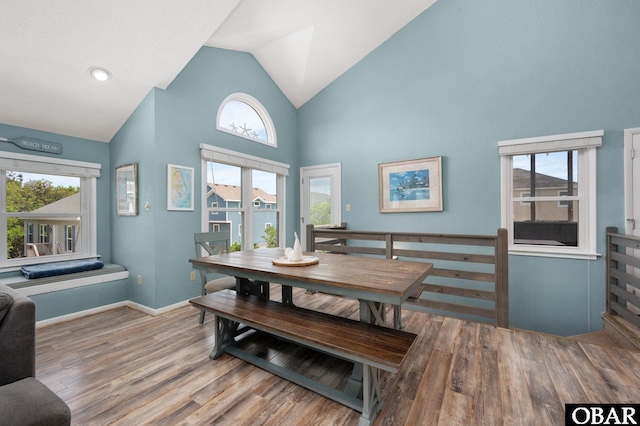 740 E Willet Ct Lot 54, Corolla, NC 27927 - dining room with plenty of natural light, wood finished floors, and high vaulted ceiling
