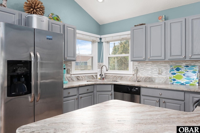 740 E Willet Ct Lot 54, Corolla, NC 27927 - kitchen with stainless steel appliances, a sink, gray cabinets, and lofted ceiling