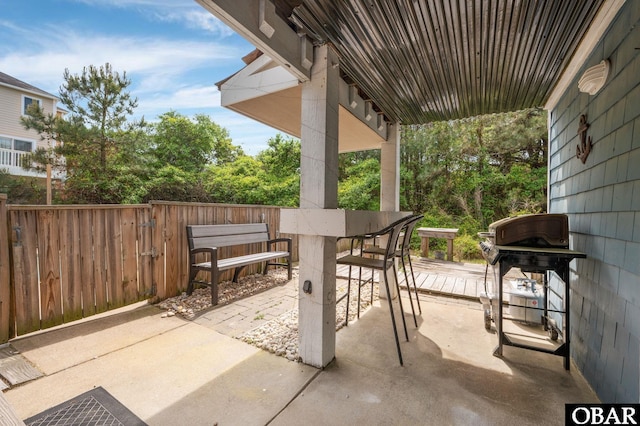 740 E Willet Ct Lot 54, Corolla, NC 27927 - view of patio with fence, outdoor dry bar, and a grill
