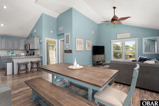740 E Willet Ct Lot 54, Corolla, NC 27927 - dining area featuring high vaulted ceiling, a ceiling fan, and a wealth of natural light