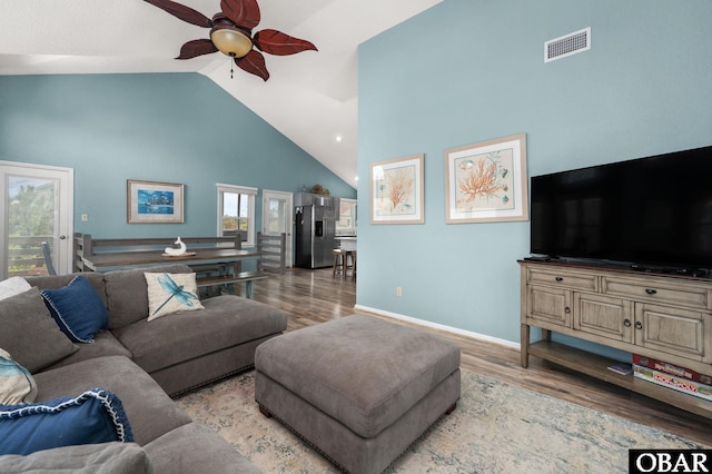 740 E Willet Ct Lot 54, Corolla, NC 27927 - living area featuring visible vents, wood finished floors, baseboards, high vaulted ceiling, and a ceiling fan