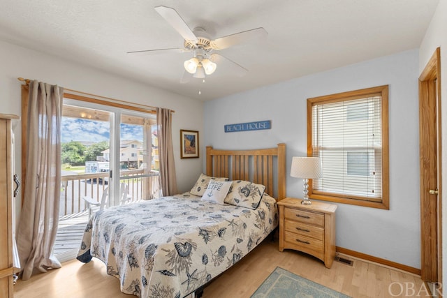 bedroom with ceiling fan, visible vents, baseboards, light wood-style floors, and access to outside