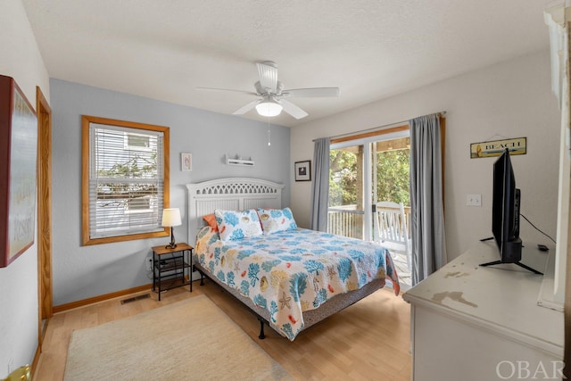 bedroom with visible vents, baseboards, ceiling fan, access to exterior, and light wood-style floors