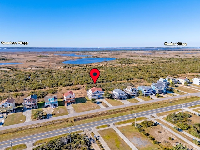 aerial view with a residential view and a water view