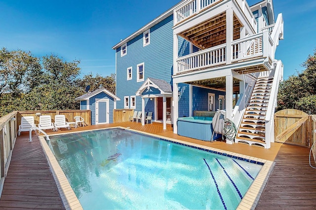 46065 Cape Point Way Lot 58, Buxton, NC 27920 - rear view of house with a wooden deck, a gate, and a hot tub