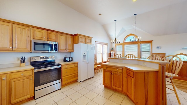 46065 Cape Point Way Lot 58, Buxton, NC 27920 - kitchen with stainless steel appliances, a chandelier, a kitchen breakfast bar, light tile patterned floors, and high vaulted ceiling