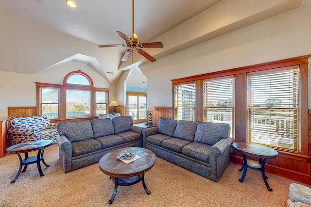 46065 Cape Point Way Lot 58, Buxton, NC 27920 - living room featuring ceiling fan, light colored carpet, vaulted ceiling, and a wainscoted wall