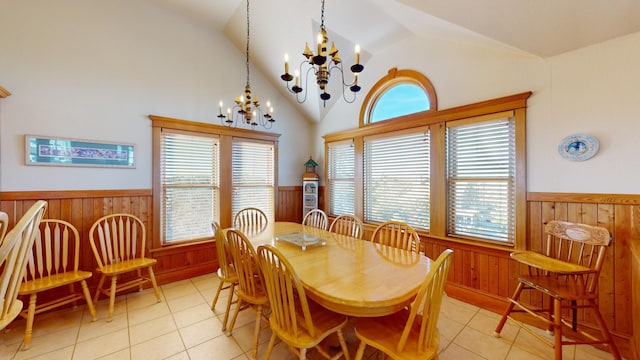 46065 Cape Point Way Lot 58, Buxton, NC 27920 - dining space with wainscoting, wood walls, a chandelier, and light tile patterned floors